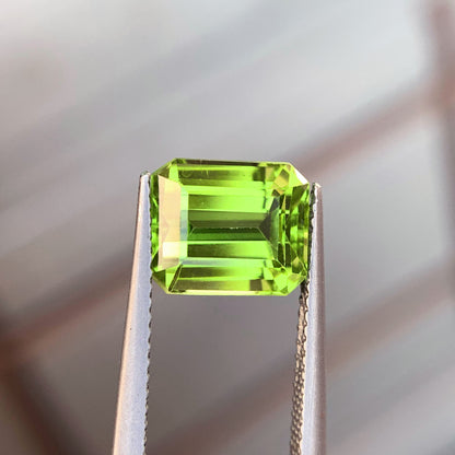 Loose peridot gemstone, 10x8x6mm, emerald cut
Natural untreated peridot gemstone, close-up view