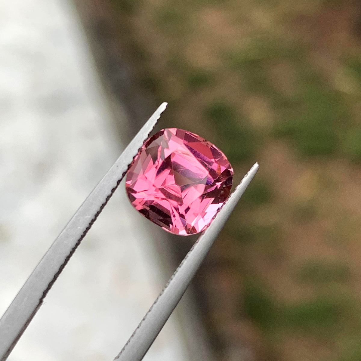 Faceted pink elbaite with square outline
Loose pink tourmaline showing its crown facets