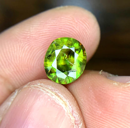 Oval cut sphene gemstone for ring setting
Titanite sphene gemstone showing natural fire and dispersion
Loose sphene gemstone, 09x08x04mm, oval cut
Natural untreated sphene gemstone, close-up view
Sphene gemstone, March birthstone, oval faceted cut
Full fire sphene stone, front angle view
Natural titanite sphene gemstone, side profile
Oval cut sphene gemstone, 2.00 carat, top view