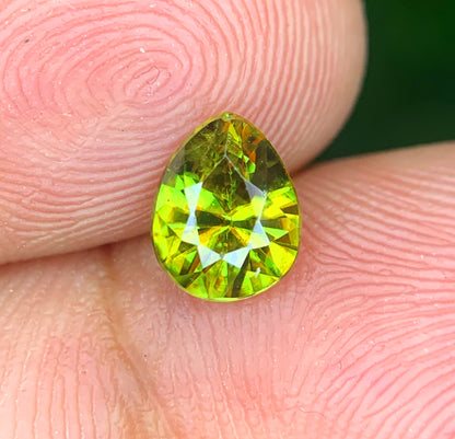 Green sphene from Skardu, Pakistan, macro shot
Natural pear cut sphene, angled view
Loose sphene gemstone for jewelry