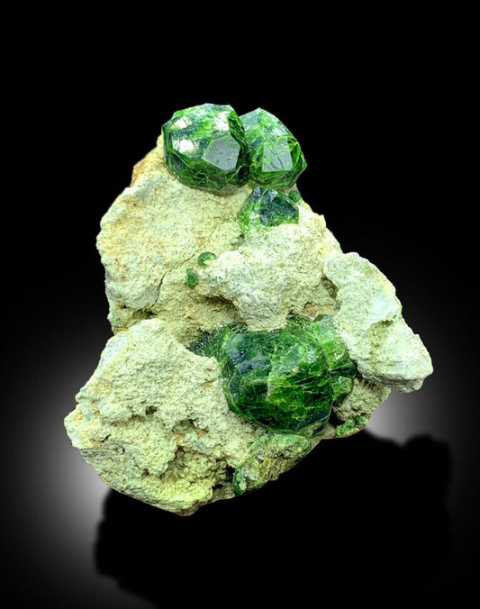 Rare green Demantoid Garnet crystal cluster on matrix
Natural Demantoid Garnet specimen from Belqeys Mountain