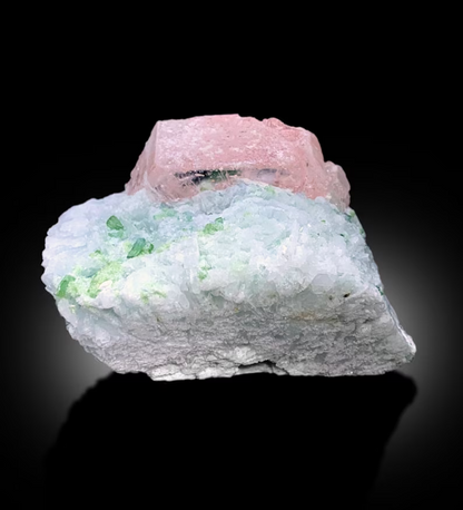 Morganite crystal termination showing natural chip
Full profile of morganite and tourmaline combination