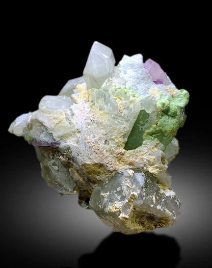 Multi-mineral specimen full length view
8.2 kilogram kunzite combination specimen complete profile
Large museum scale mineral specimen from Afghanistan