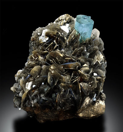 Natural aquamarine amazing color excellent luster
Large aquamarine specimen with silvery muscovite mica