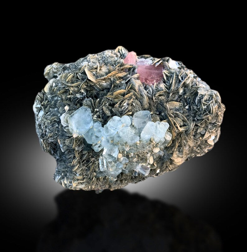 Large aquamarine combo specimen, front angle view
Pink apatite crystal detail on aquamarine cluster