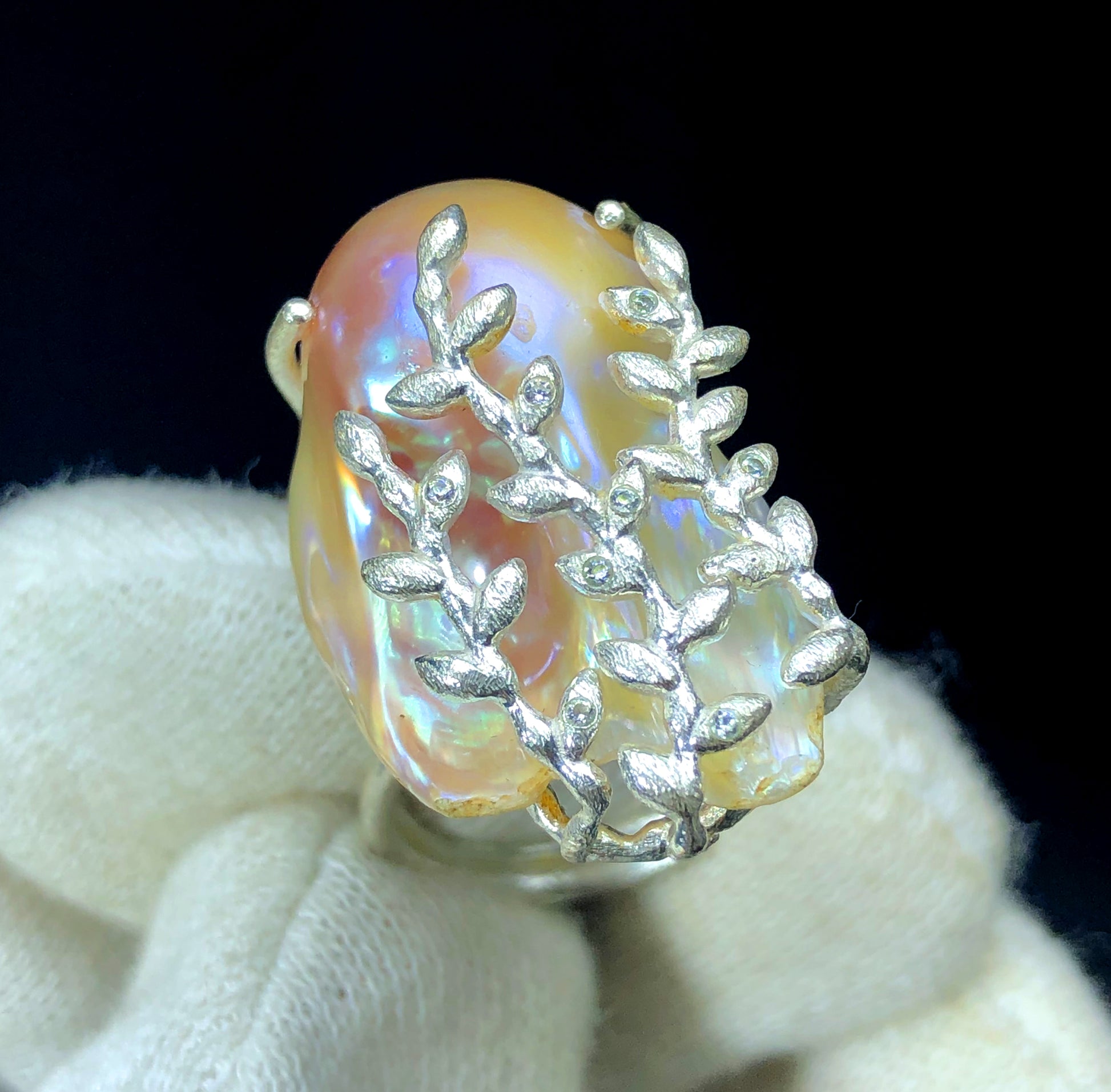 Natural baroque pearl ring gold band close-up
Delicate pearl ring sterling silver handmade jewelry