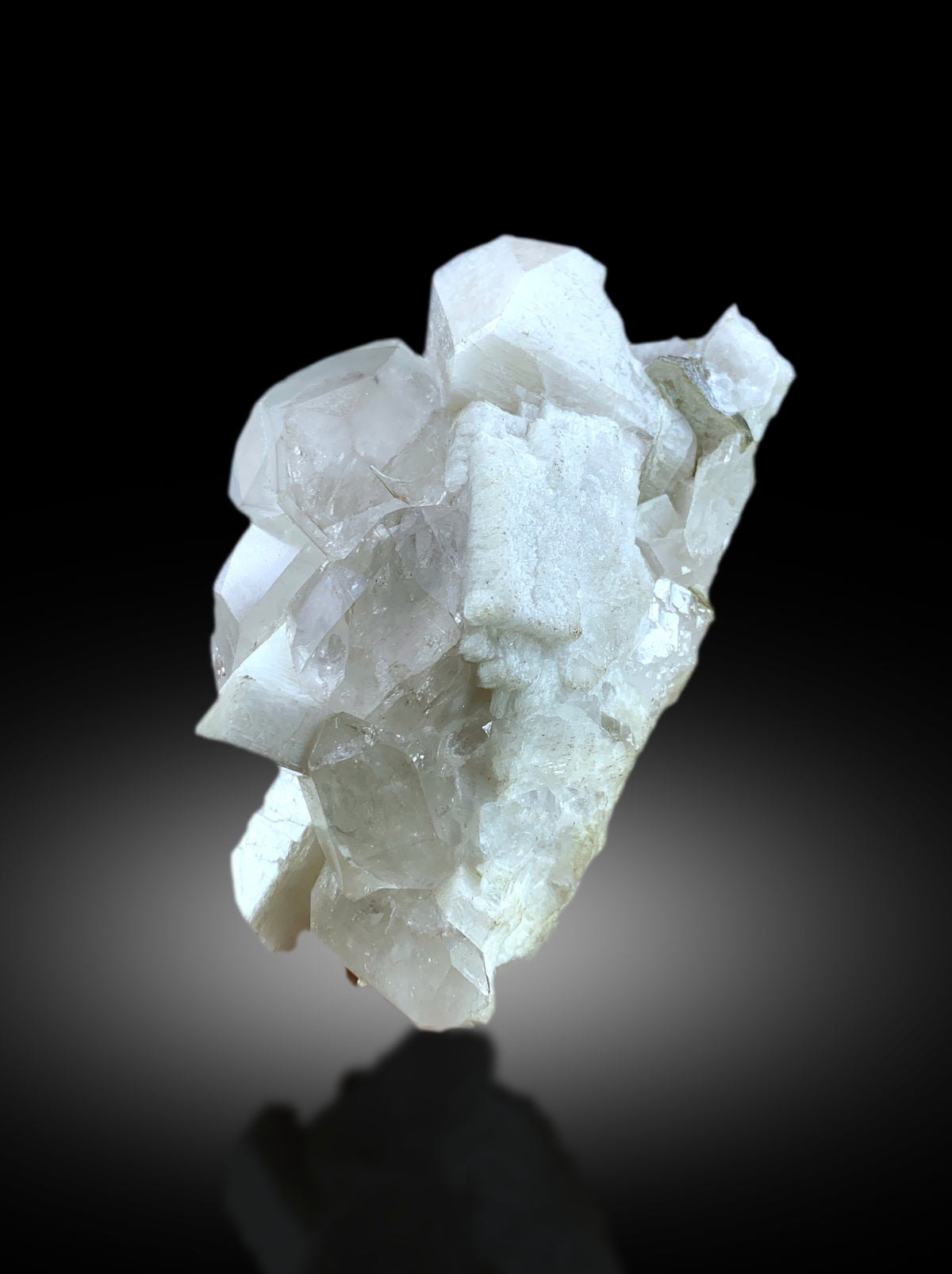 Natural blue aquamarine with schorl Shigar Valley
Closeup of aquamarine crystal termination and luster
Aquamarine specimen with microcline feldspar side view
Top view of 516 gram aquamarine specimen
Aquamarine crystal with scale reference for size