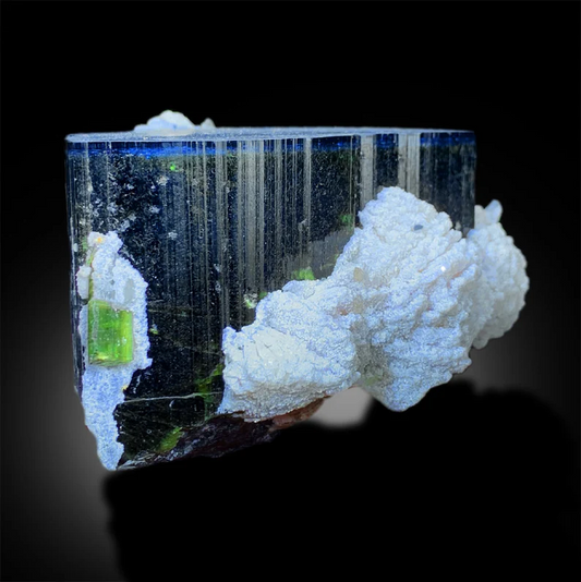 Blue cap tourmaline with cleavelandite from Paprok Afghanistan
Natural elbaite tourmaline blue green termination close-up