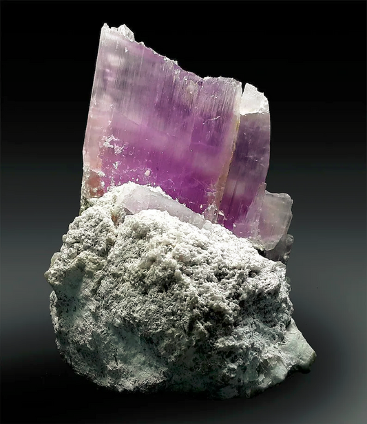 Museum size pink kunzite specimen from Afghanistan
Natural kunzite crystal with lepidolite matrix