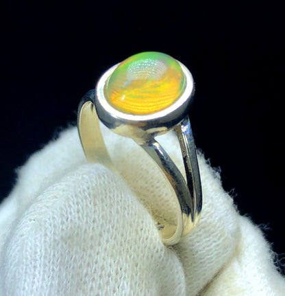 Natural opal ring showing rainbow color shift
Ethiopian opal sterling silver statement ring