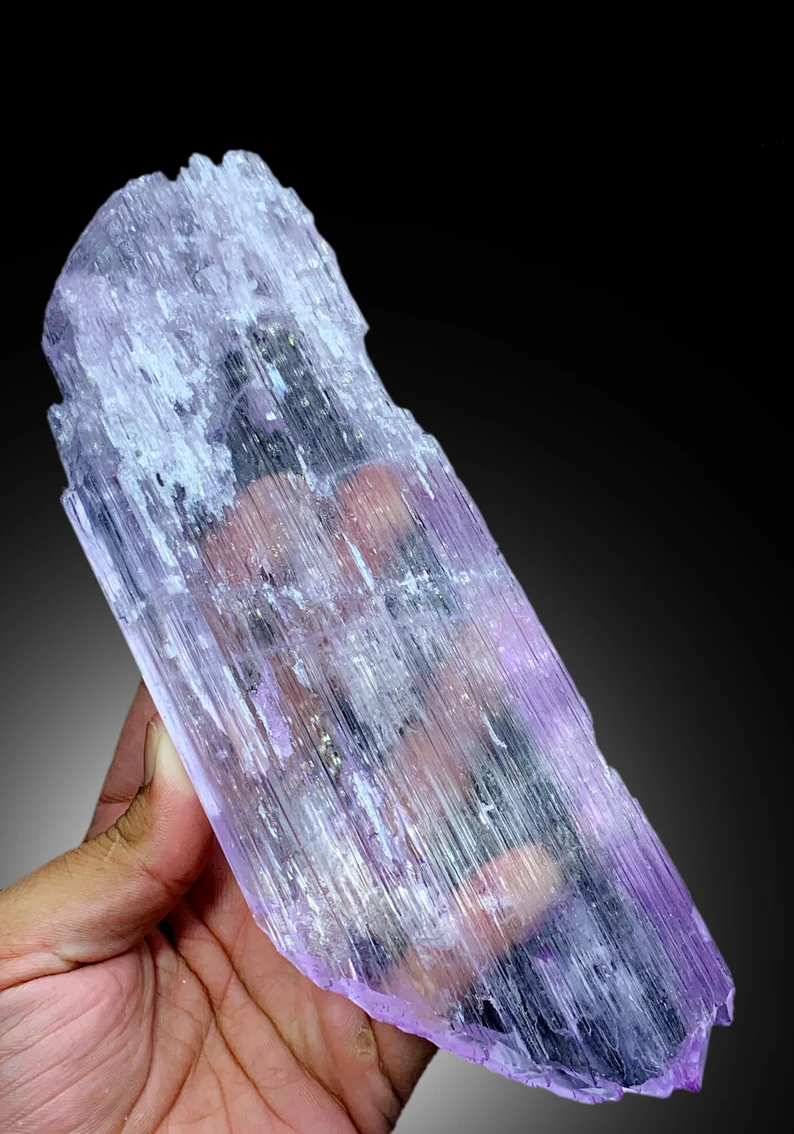 Natural pink kunzite crystal, side angle view