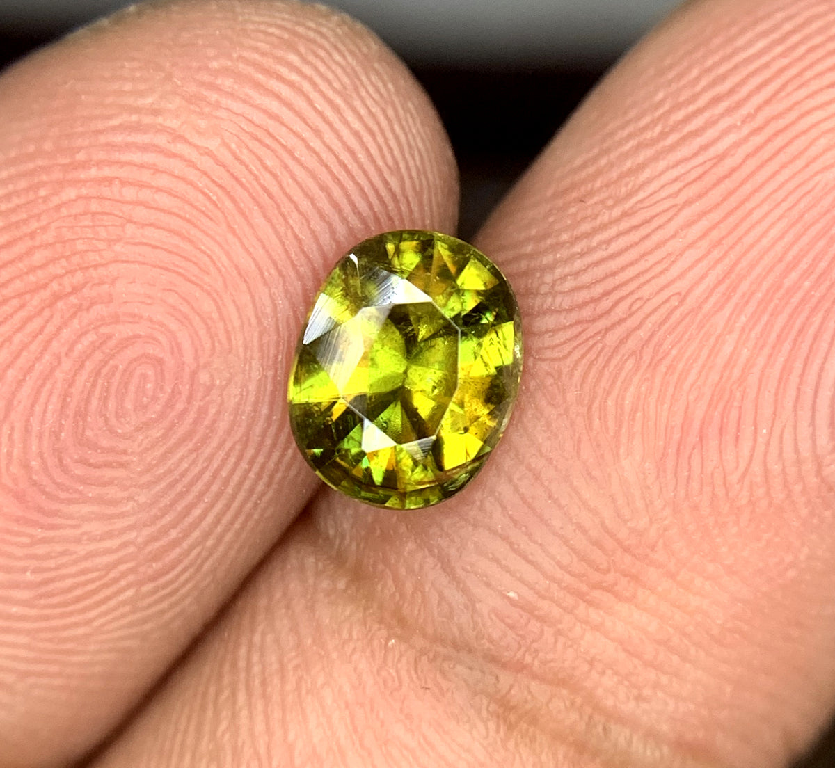 Natural sphene gemstone, 1.10 carat, top view
Sphene gemstone from Skardu, Pakistan, macro detail