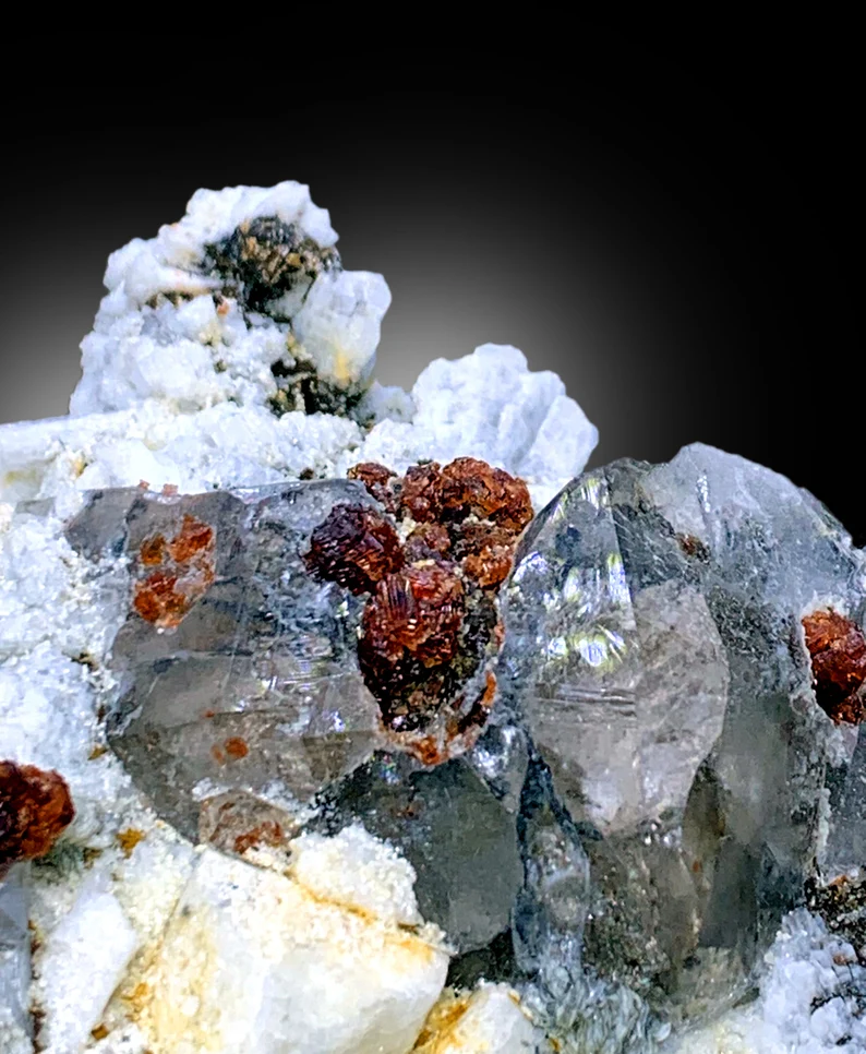 Natural untreated garnet specimen, front view
Red garnet crystals showing natural luster