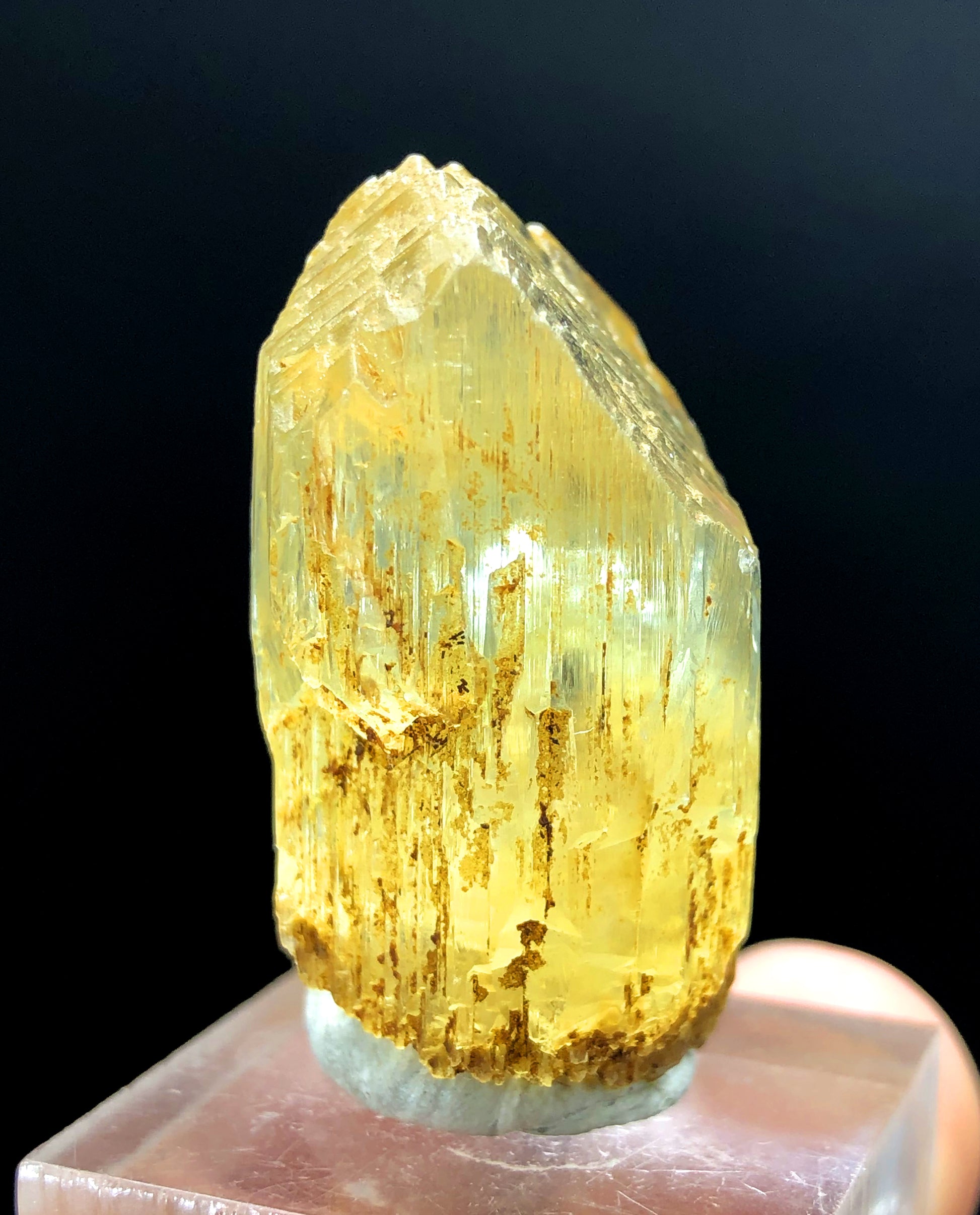 Natural yellow color detail on small triphane crystal
Small etched triphane crystal for display