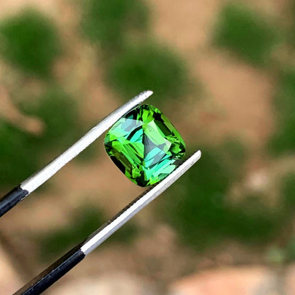 October birthstone tourmaline natural loose stone
Greenish blue tourmaline faceted stone side profile
Natural afghan tourmaline gemstone for collection 