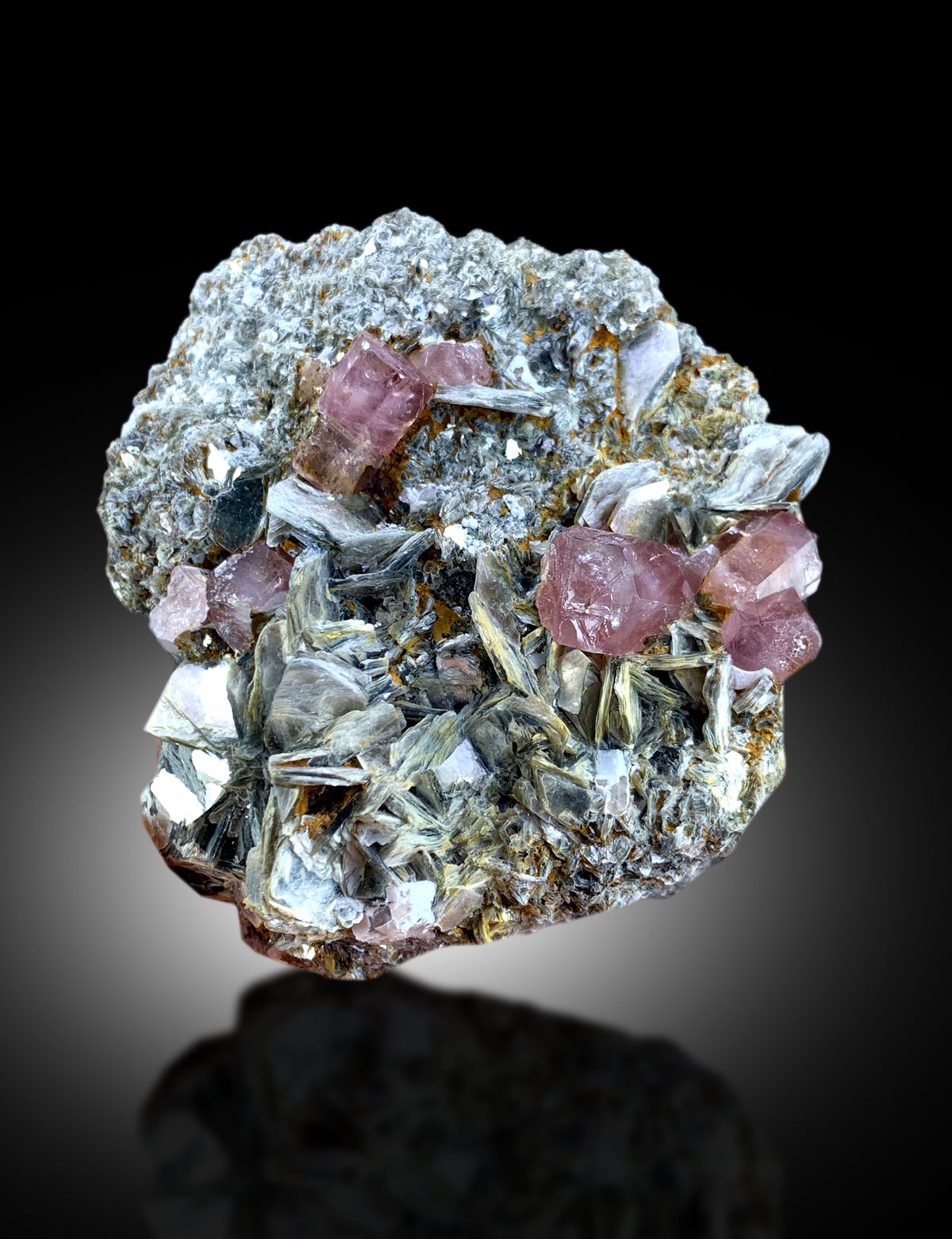 Pink apatite specimen, collector display scale
Natural apatite with mica, close color detail