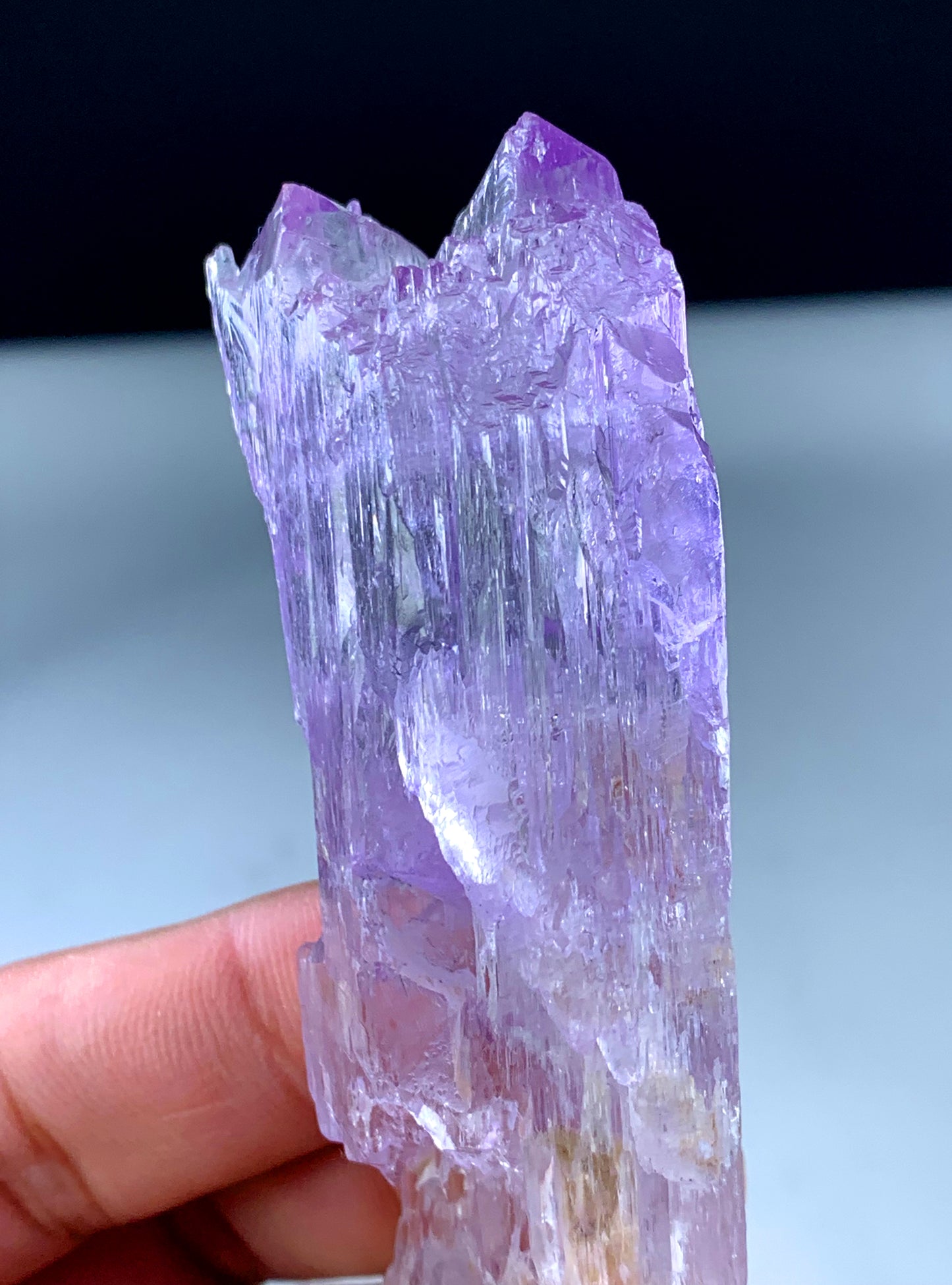 Pink kunzite Afghanistan natural pink color close-up
Mountain shape kunzite termination side profile view
