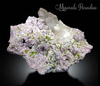 Pink lepidolite with green tourmaline color contrast
Self-standing green tourmaline cluster 371x245mm