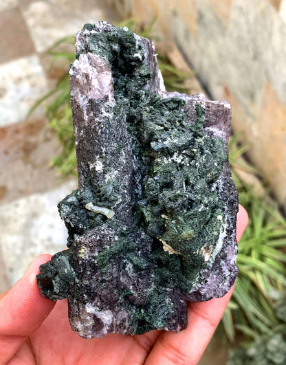 Purple scapolite crystal with green diopside contrast