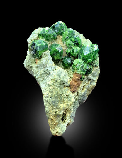 Rare green Demantoid Garnet crystal cluster on matrix
Natural Demantoid Garnet specimen from Belqeys Mountain