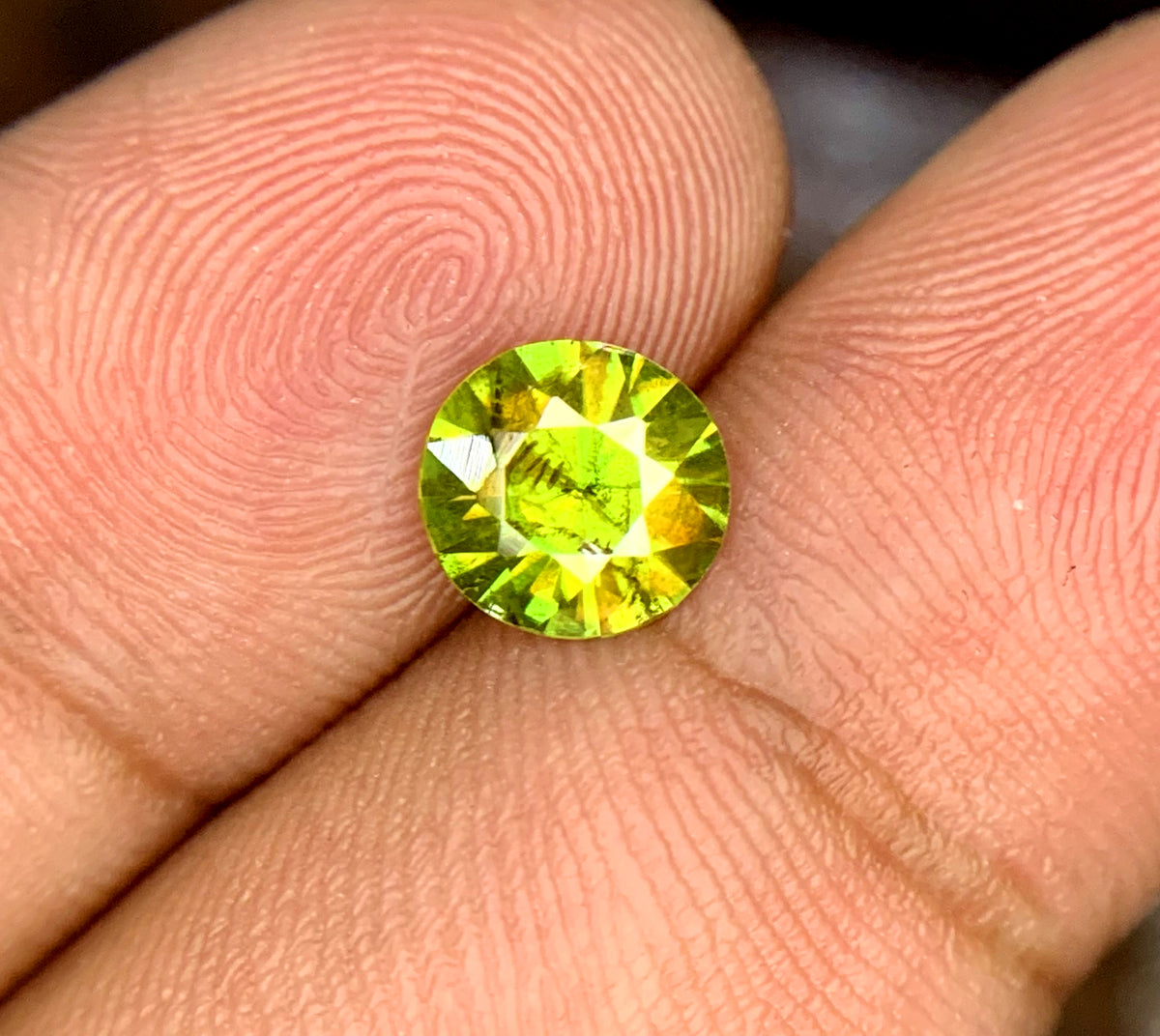 Loose sphene gemstone, 07x07x04mm, round cut
Natural untreated sphene gemstone, close-up view
Sphene gemstone, March birthstone, round faceted cut
Full fire sphene stone, front angle view
Natural titanite sphene gemstone, side profile
Round cut sphene gemstone, 1.05 carat, top view