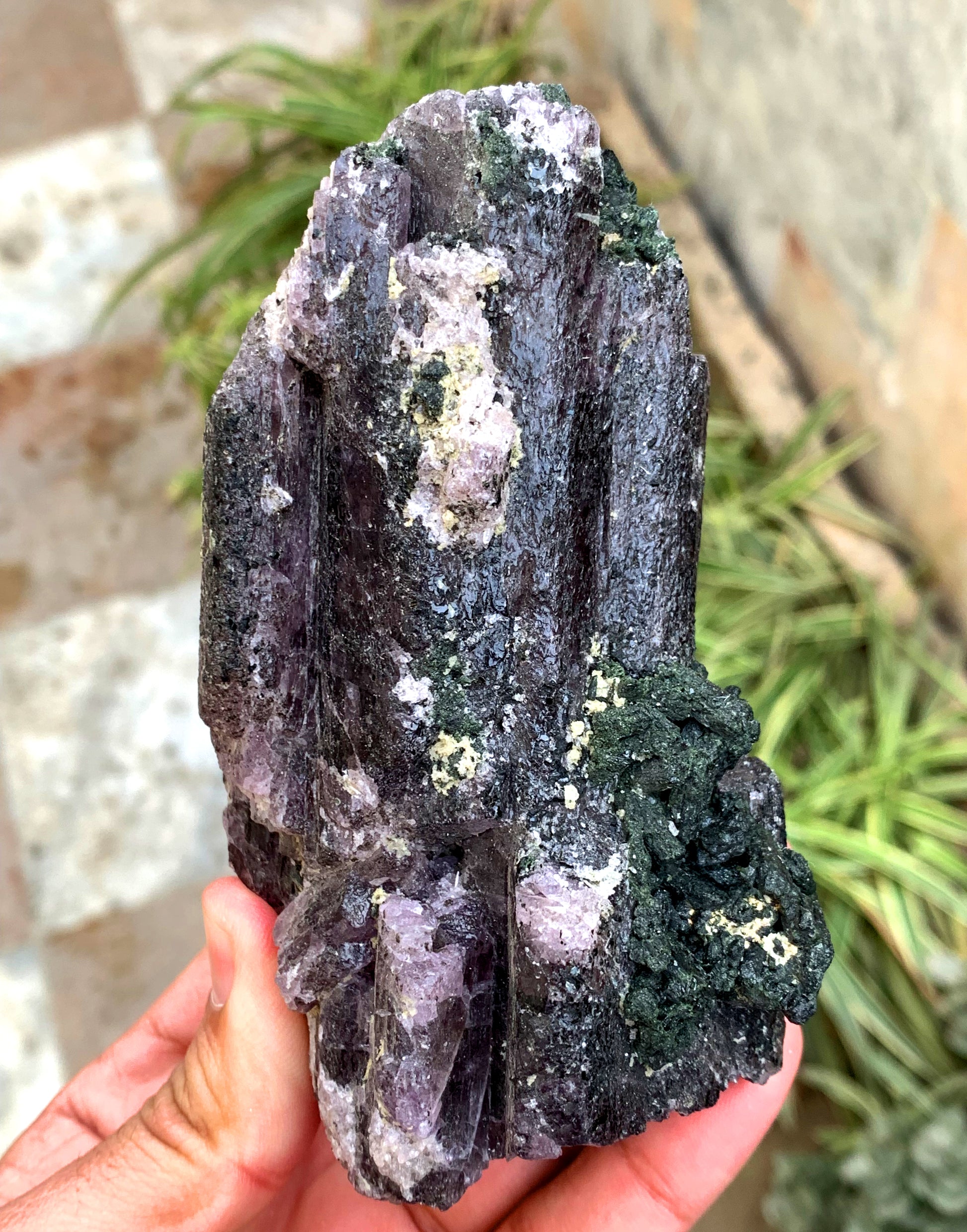 Scapolite crystal showing natural purple color