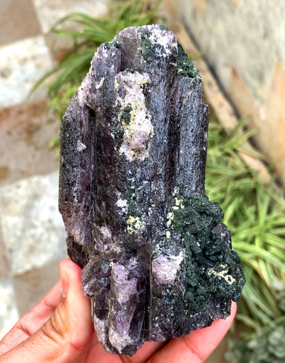 Scapolite crystal showing natural purple color