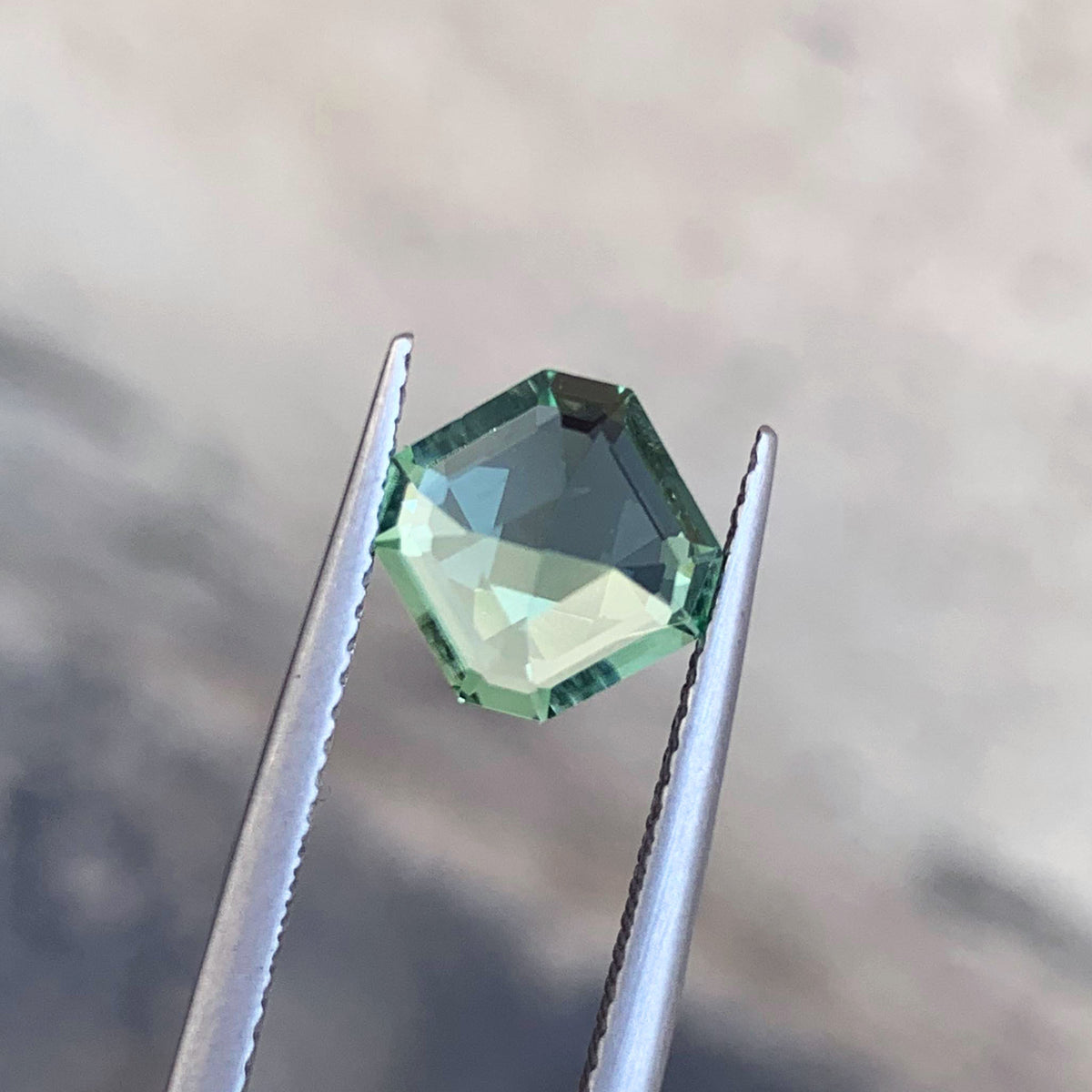 Sea foam tourmaline, 8x8x5mm, loose stone
Natural untreated tourmaline gemstone, close-up