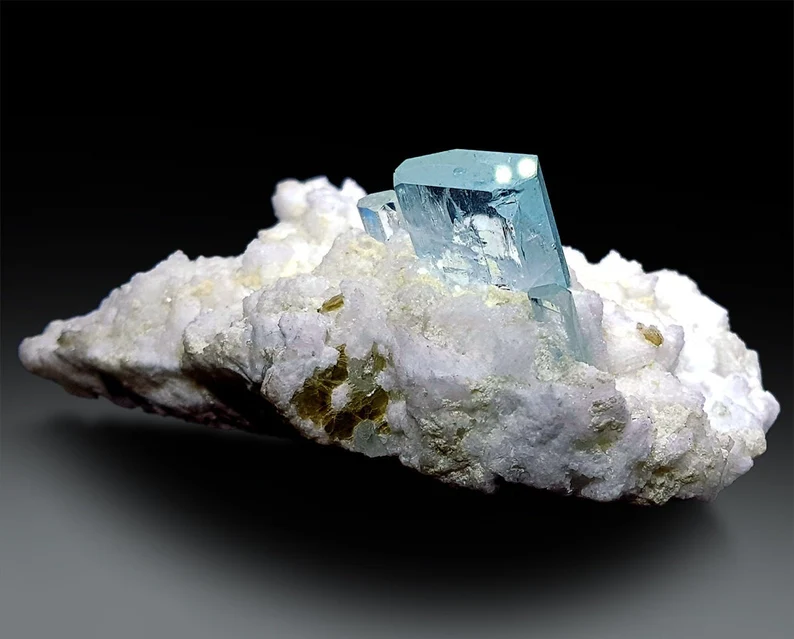 Sky blue beryl crystal on white feldspar Skardu Pakistan
Natural aquamarine specimen aesthetic display position top view