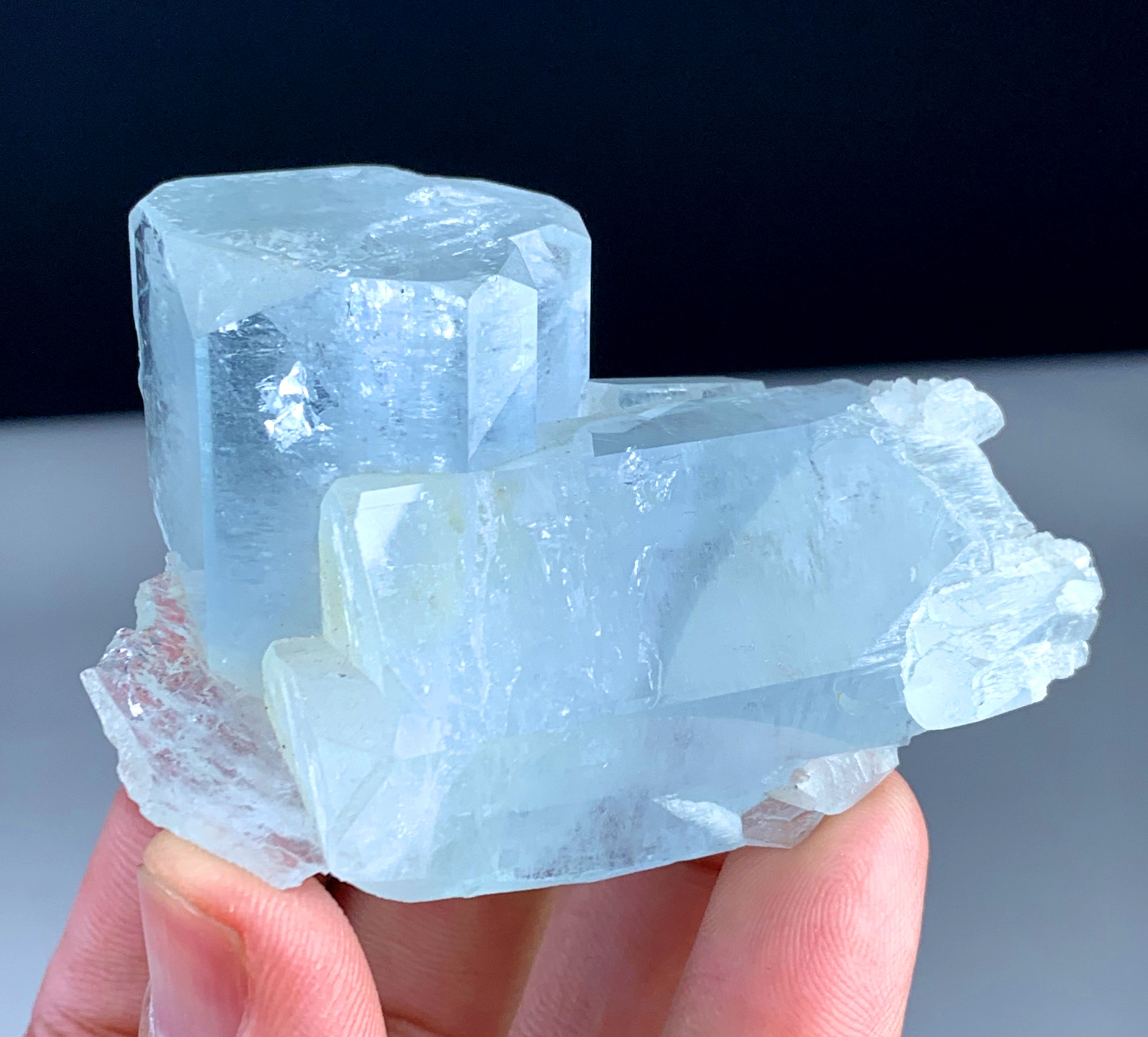 Sky blue color detail on aquamarine crystal
Raw mineral aquamarine crystal on display stand