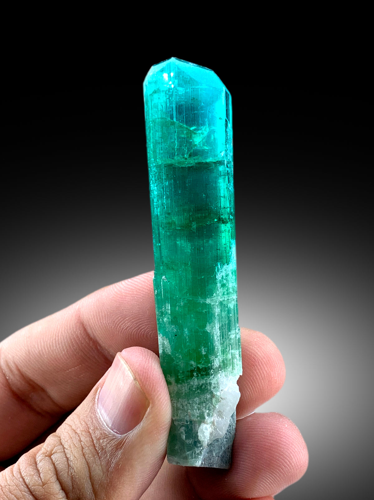 Terminated neon blue tourmaline, close luster detail
Raw tourmaline crystal from Afghanistan, top view