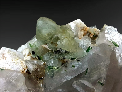 Terminated topaz crystal with microlite detail
Full profile of five mineral combination specimen