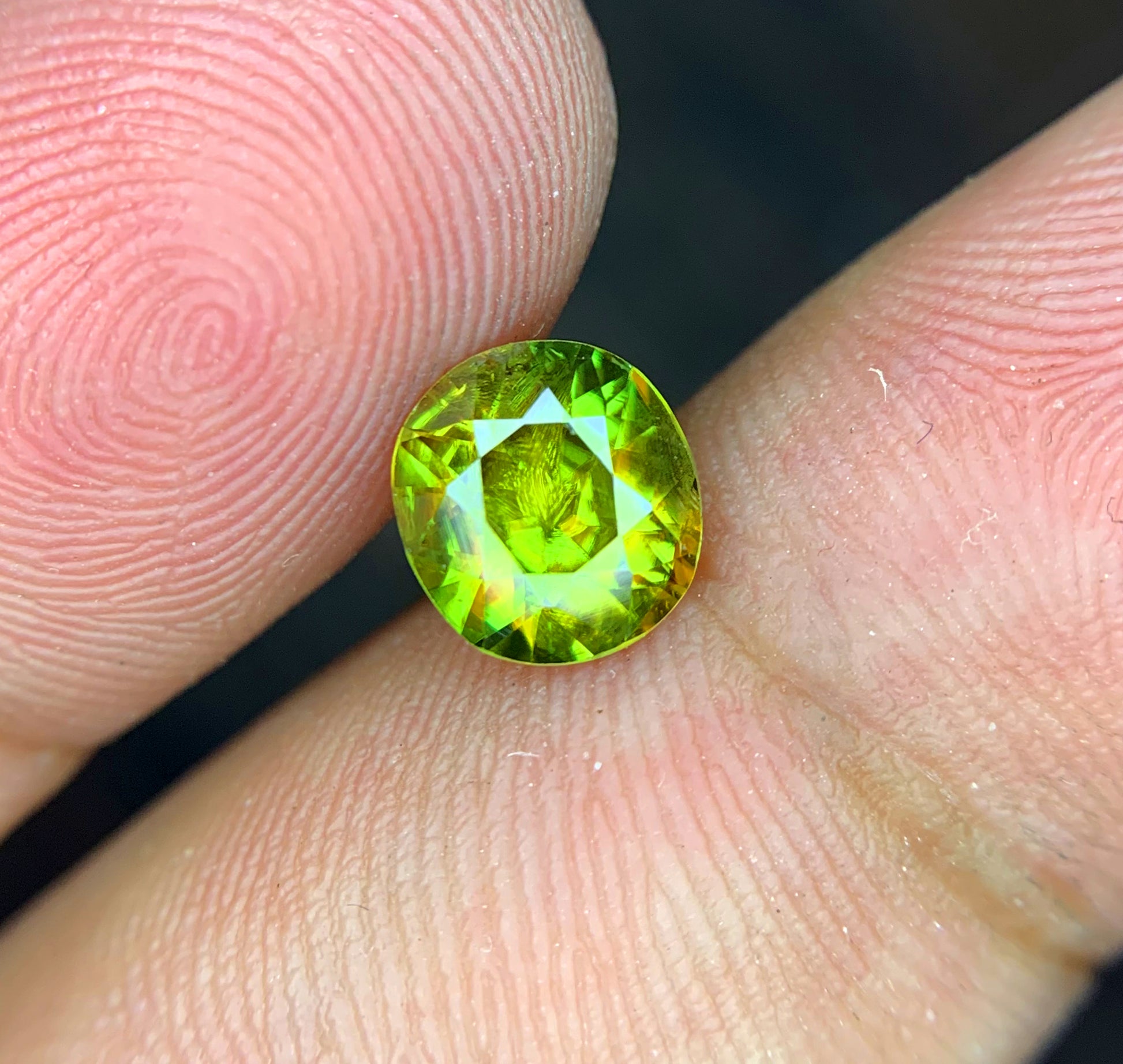 Titanite sphene gemstone 0.95ct profile view
Pakistani Himalayan sphene round cut collector stone