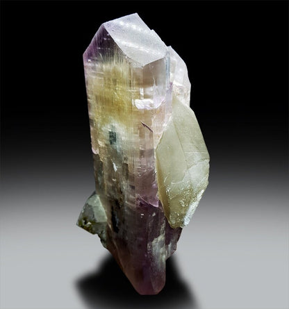 Top view of 1768 gram kunzite specimen
Twin kunzite crystals with scale reference