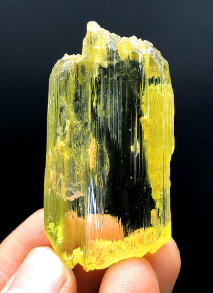Transparent yellow color detail on triphane crystal
Raw etched triphane crystal on display
