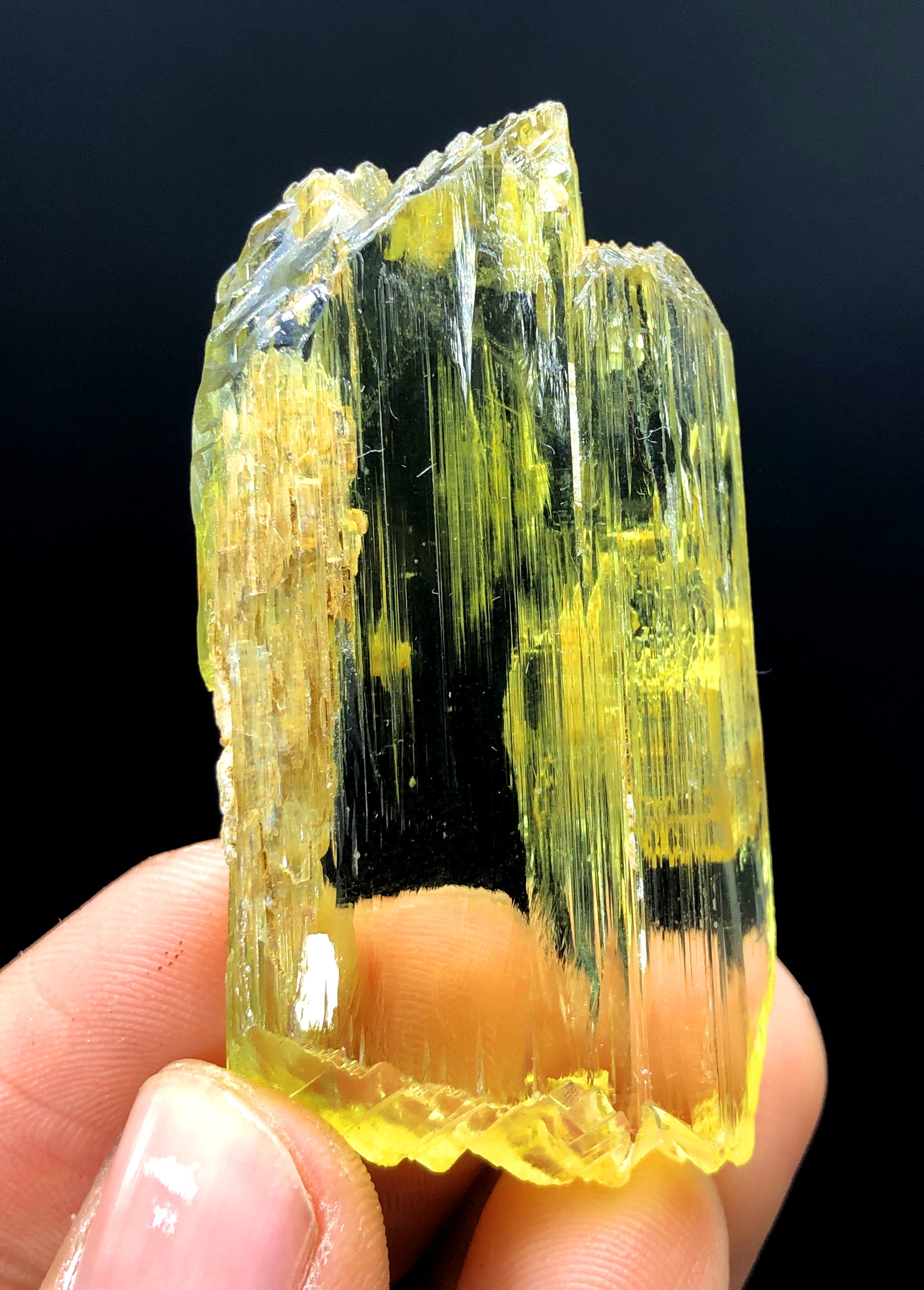 Triphane crystal faces showing luster and clarity
Afghanistan triphane crystal detail view
Natural untreated yellow triphane crystal specimen