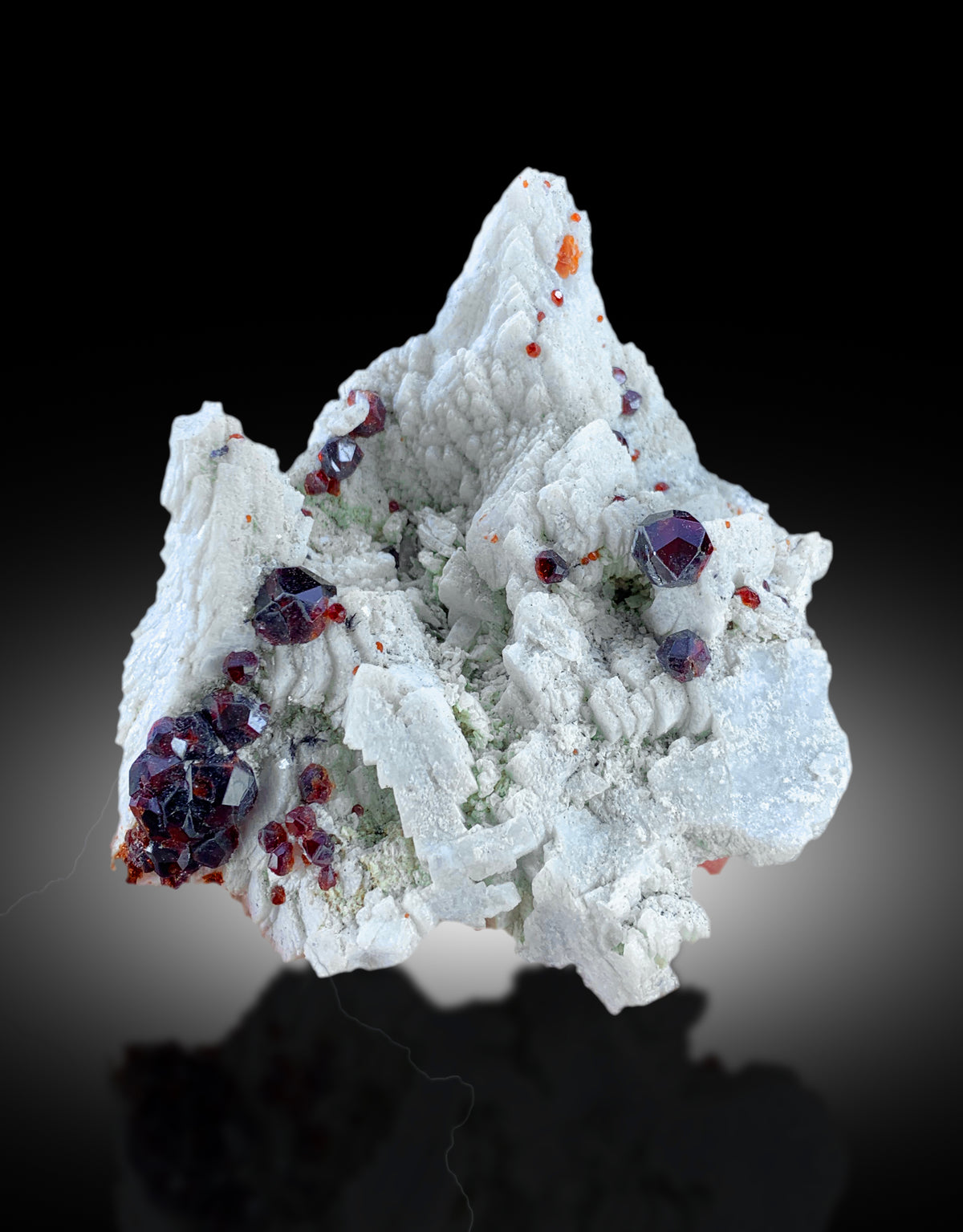 Untreated red garnet specimen on natural matrix
Natural garnet crystals, self standing display specimen