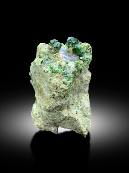 rare demantoid garnet mineral from belqeys mountain
aesthetic garnet and calcite mineral association