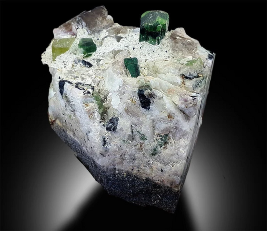 Tourmaline with triphane kunzite apatite quartz combo specimen
Green tourmaline crystal terminated specimen Afghanistan