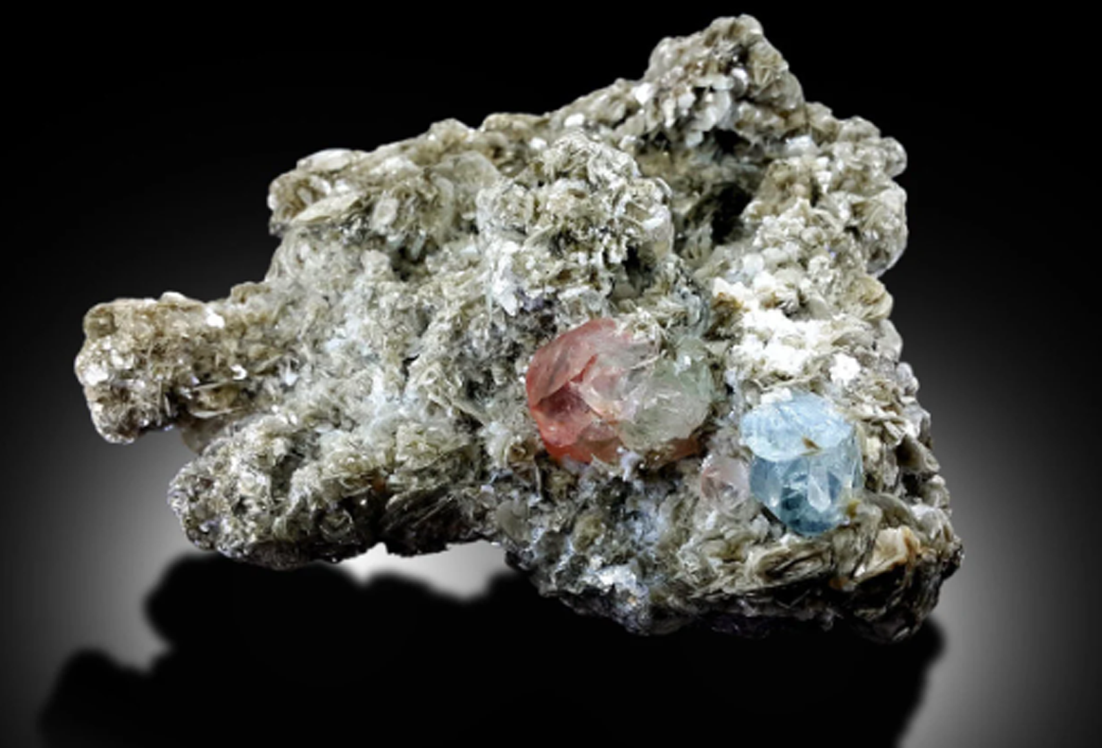 pink fluorite on muscovite mica
aquamarine
aquamarine and fluorite collector piece