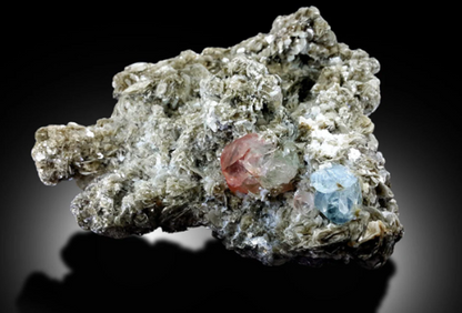 pink fluorite on muscovite mica
aquamarine
aquamarine and fluorite collector piece