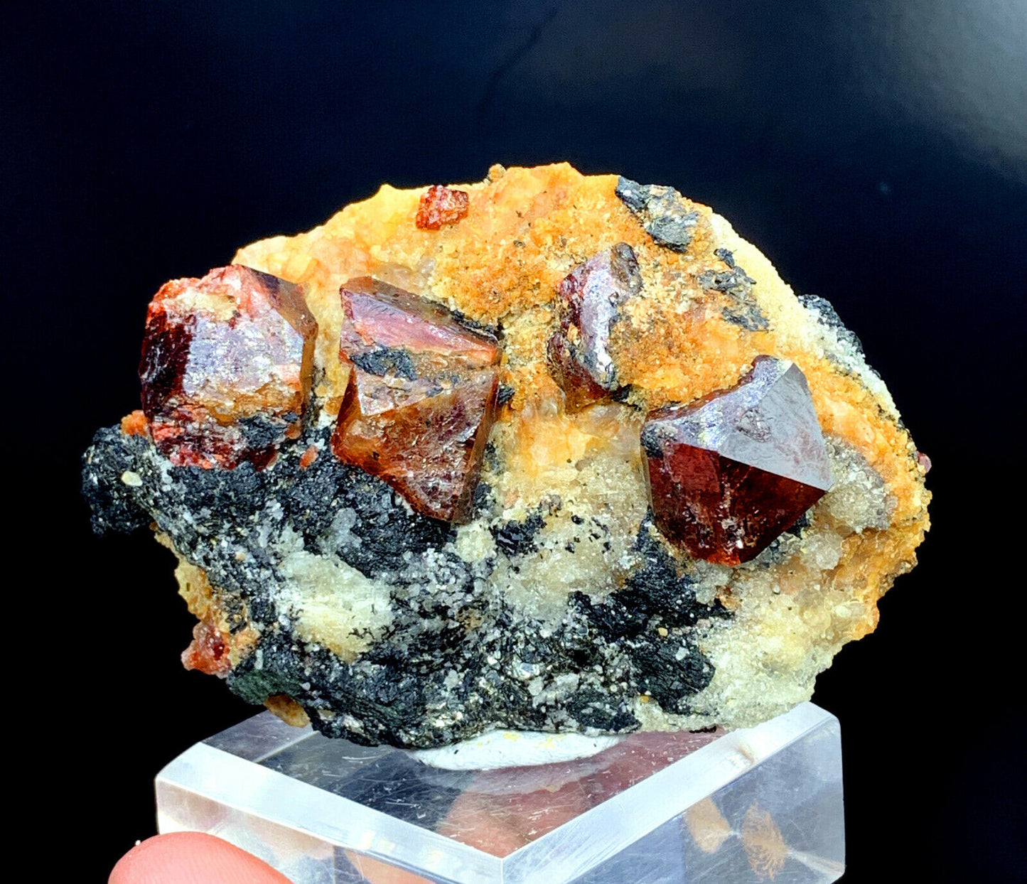 detailed view of natural red zircon specimen
cabinet display zircon mineral from pakistan
raw zircon crystal formation with natural matrix