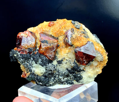 detailed view of natural red zircon specimen
cabinet display zircon mineral from pakistan
raw zircon crystal formation with natural matrix