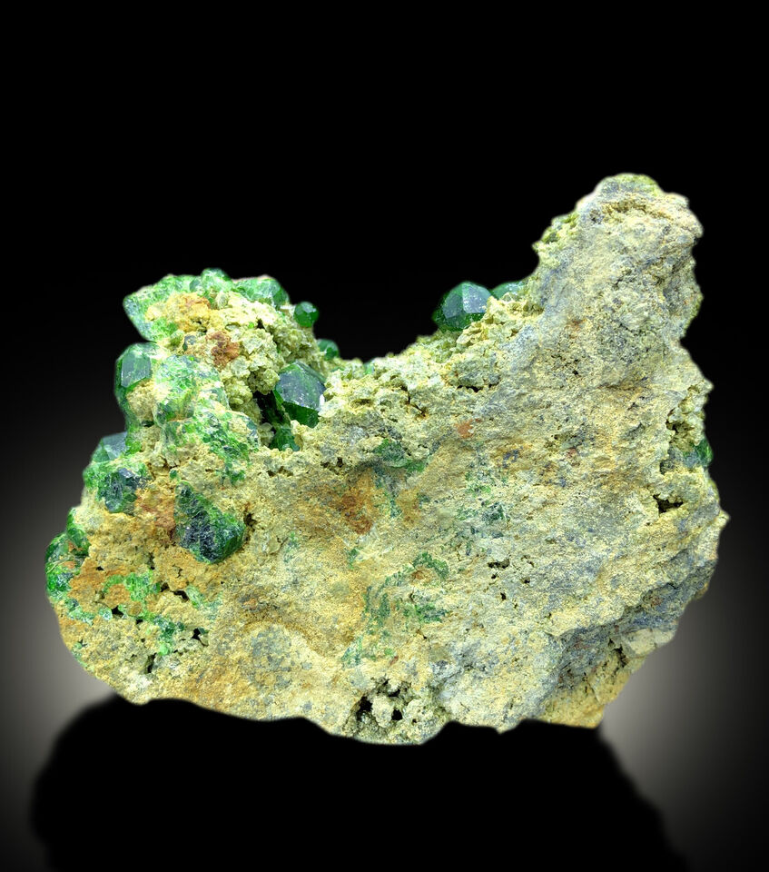 rare green garnet specimen for collectors
natural mineral specimen with green garnets