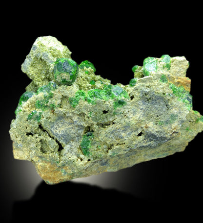 vivid green garnet crystal arrangement
collector mineral from Belqeys Mountain