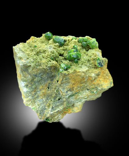 lush green demantoid garnet crystals on matrix
demantoid garnet specimen from Koh e Belqeys