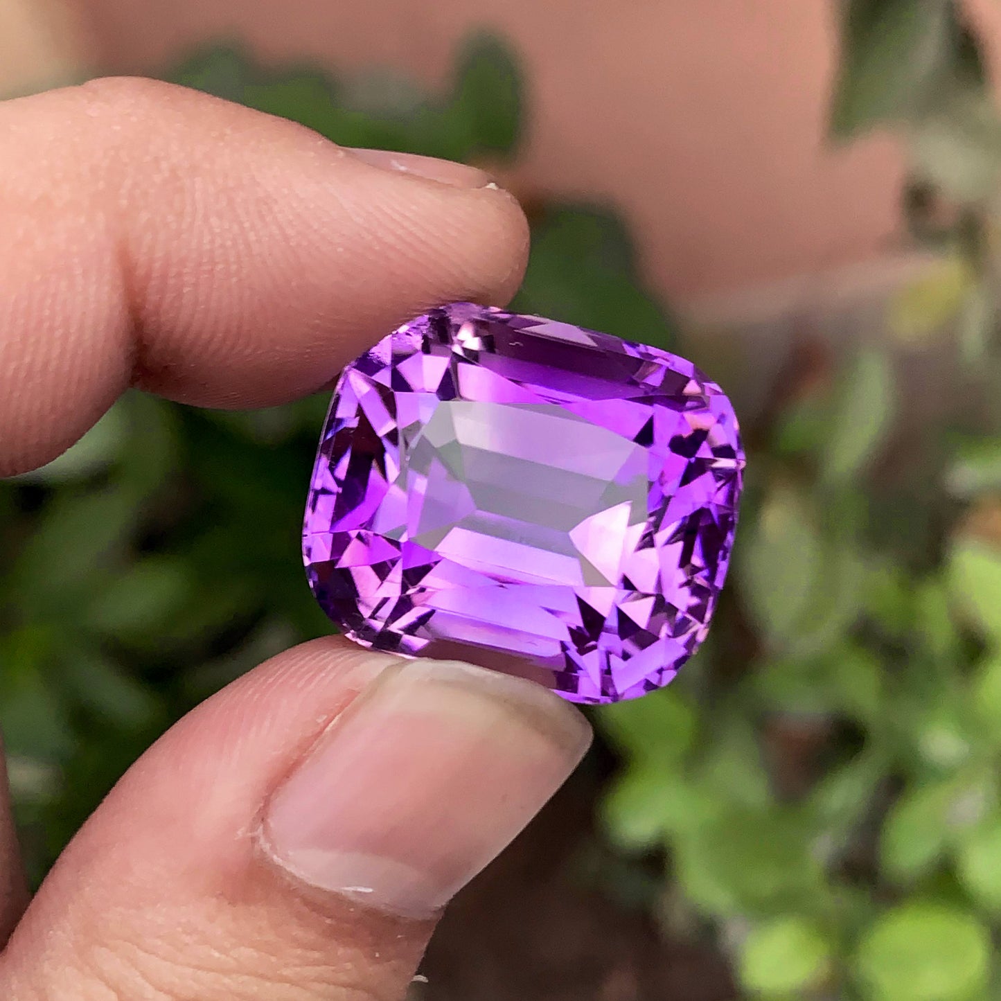 large cushion cut amethyst
faceted amethyst gemstone