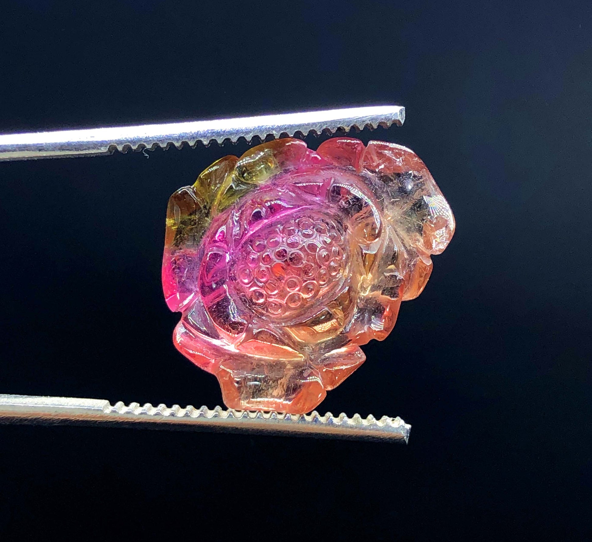 fine bicolor tourmaline carving
gemstone carving with natural color zoning