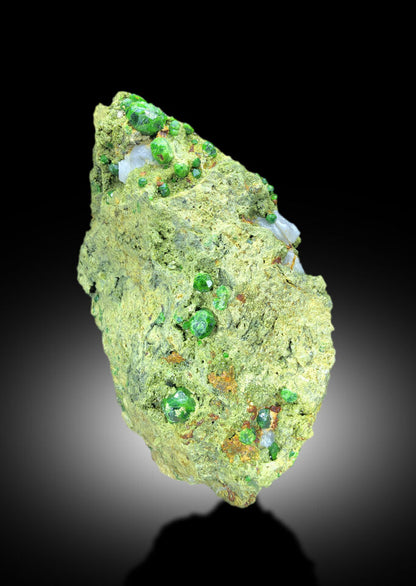 large demantoid garnet crystal specimen 3040g
green demantoid garnet with calcite on matrix