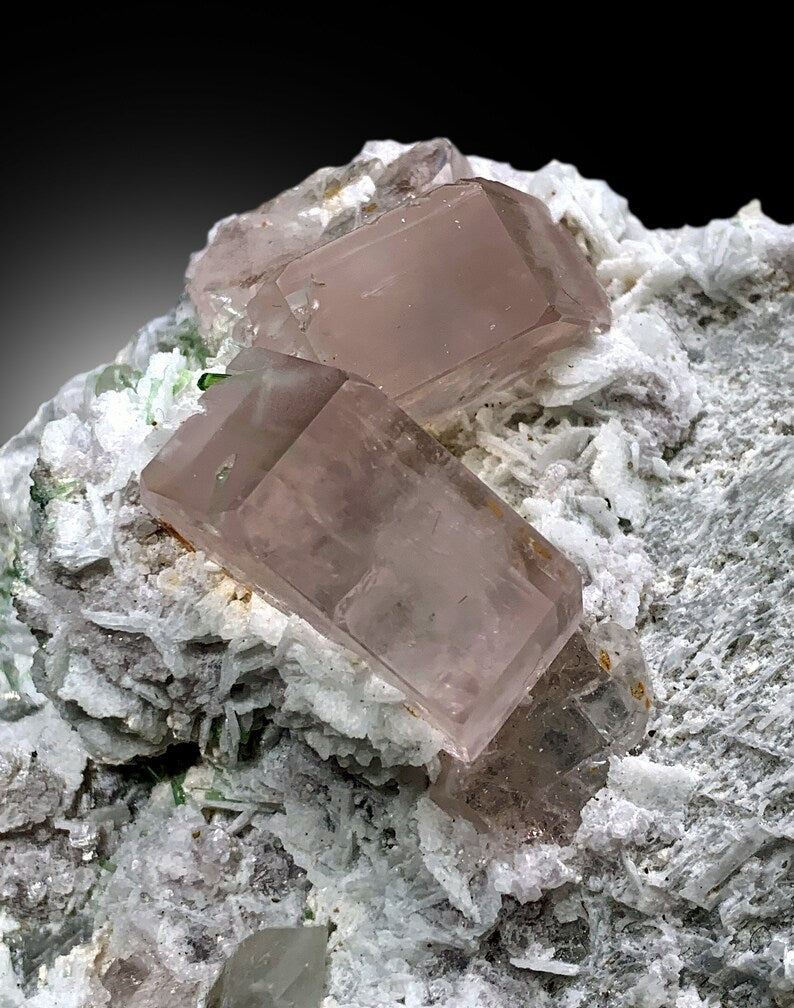 green tourmaline and morganite mineral association
natural morganite quartz feldspar display specimen
premium Afghanistan morganite mineral specimen
pink beryl crystals with rare microlite inclusion